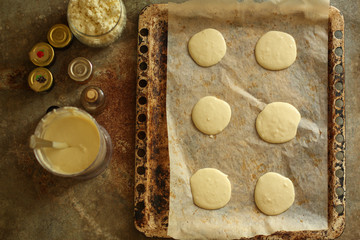 cupcakes cake from cottage cheese or cheese cakes (dough in the form). Top view