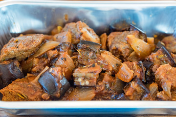 Eggplant stew with meat close up view