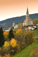 Fototapeta na wymiar The church of Villandro during autumn season, near Bolzano. Italy. 