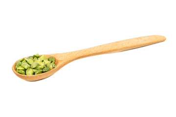 Dry green peas in spoon