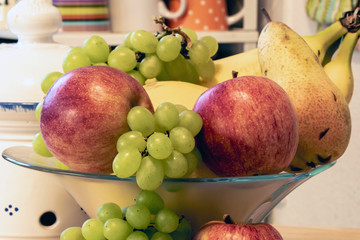 Different fresh fruits as ingredients for the vegan and healthy cuisine.