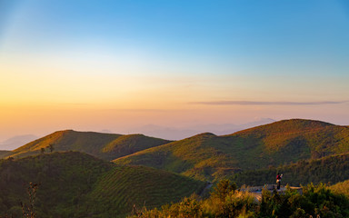 Landscape of the mountain with blue sky in the morning. Beautiful mountain with cloud and sunrise at Tong Pha Phoom national park ,Thailand.