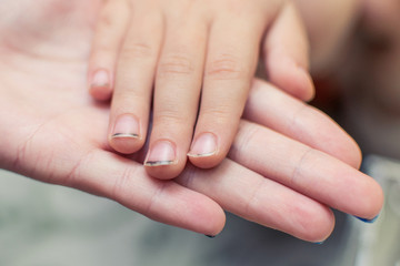 Dirt under the nails of a child. Hygiene children's hands.