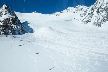 Winter landscape - Panorama of the ski resort with ski slopes. Alps. Austria. Pitztaler Gletscher....