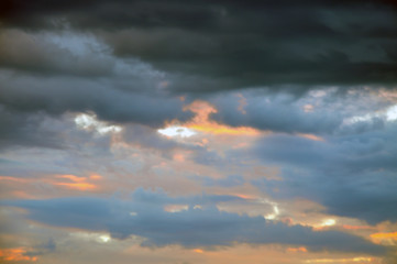 Beautiful rainy storm clouds during sunset