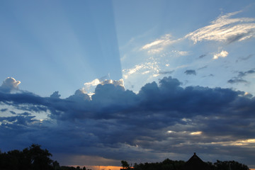 Clouds through which pass the rays of the sun at dawn