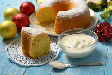 donut-shaped yogurt cake with Christmas decorations around