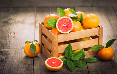 Fresh red grapefruit in the crate 