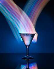 Martini glass on the background of neon lights
