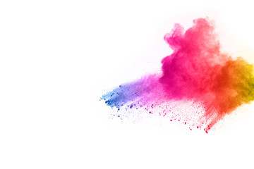 abstract powder splatted background. Colorful powder explosion on white background. Colored cloud....