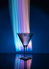 Martini glass on the background of neon lights