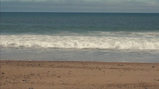 RL DOLLY view of a shore of Atlantic Ocean at sunset. 4K UHD