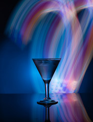 Martini glass on the background of neon lights