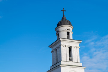 Fototapeta na wymiar The Metropolitan Cathedral Nativity of the Lord steeple towards a blue sky, in Chisinau, Moldova