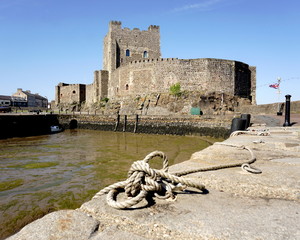 Carrickfergus Castle. A 12th century Norman Irish castle situated on the shore of Belfast Lough in Northern Ireland © navorolphotography