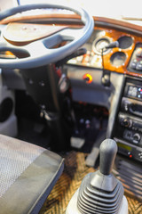 Driver's place of a bus with gearbox handle under the frontground