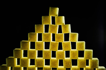 A composition of sugar cubes illuminated with multicolored light sources