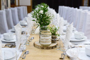 Wedding decor table setting and flowers.