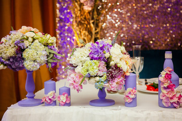 Luxury wedding table with flowers and trees. Beautiful flowers, close-up