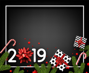 Happy New Year 2019 card with fir branches, gifts, candy and confetti. Top view card.