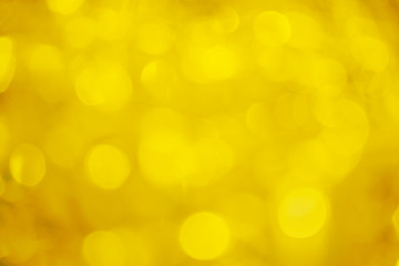 Obraz premium Soft yellow bokeh abstract background. Defocused backdrop.