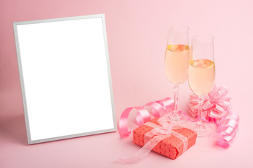 Champagne, gift, bow. Invitation, birthday, party on the occasion of girlhood, the concept of a baby shower, a holiday on a pink background. Banner for inscriptions, announcements for birthday