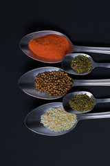 spices in spoons