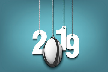 2019 New Year and rugby ball hanging on strings