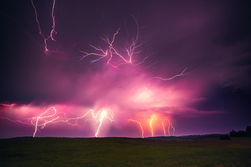 Naklejka na ściany i meble Composite landscape image of lightning thunder-storm, Lithuania