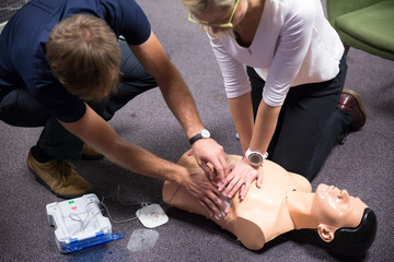 First aid cardiopulmonary resuscitation course using automated external defibrillator device, AED.