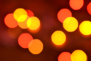 Orange and red bokeh. The background with boke. Abstract texture