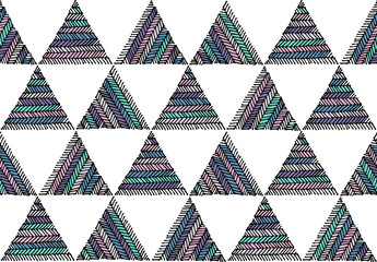Seamless ethnic hand drawn color geometric pattern on white
