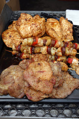 Grilling meat products at a picnic