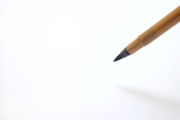 筆ペンで書く