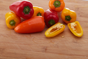 A Variety color of chili pepper at chopping board