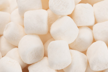 Fototapeta na wymiar Background of Mini White Marshmallows