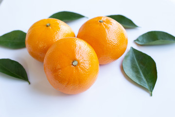 Fresh orange citrus fruit on white