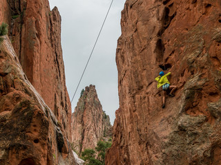A girl doing rock climbing