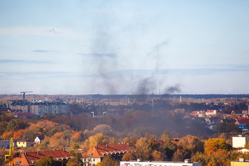 black smoke over the city