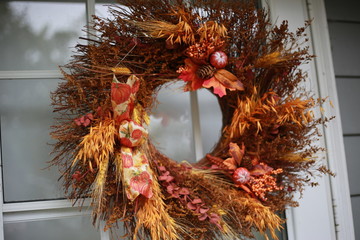 Fall dried flower wreath on the front door