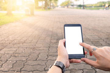 Hand using  Mobile Phone urban street