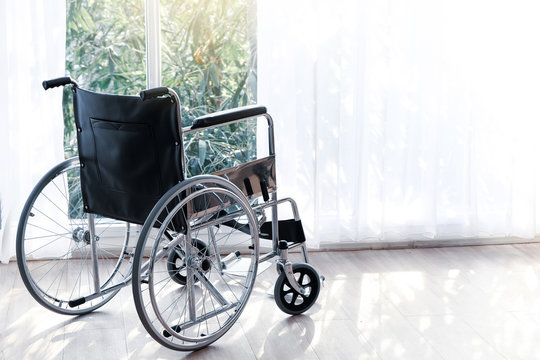 The Wheelchair Patient Bed Is In The Hospital Ward.