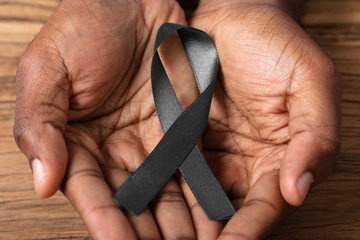 Ribbon To Support Melanoma Skin Cancer Awareness