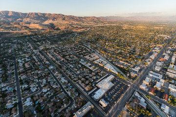 Late afternoon aerial towards Devonshire St and Canoga Ave in the Chatsworth neighborhood of the San Fernando Valley area in Los Angeles, California. - obrazy, fototapety, plakaty