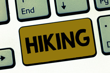 Writing note showing Hiking. Business photo showcasing walk for long distance especially across country on foot Kind sport.
