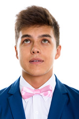Face of young handsome man thinking while looking up  © Ranta Images