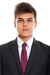 Face of young handsome businessman looking at camera