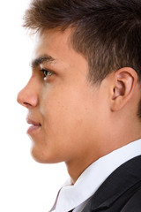 Obraz premium Profile view of face of young handsome businessman