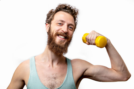 A funny mature bearded attractive guy with skinny torso, posing isolated over white studio background with raised folded hands