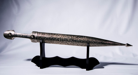 dagger on white background © Надежда Иванеева